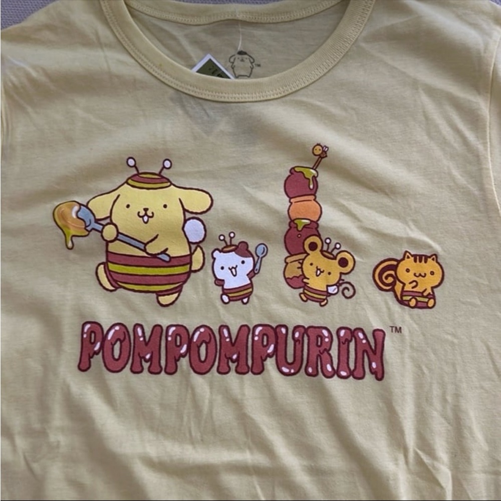SANRIO POMPOMPURIN YELLOW GRAPHIC
T-SHIRT JUNIOR SIZE XS NWT - Picture 4 of 6